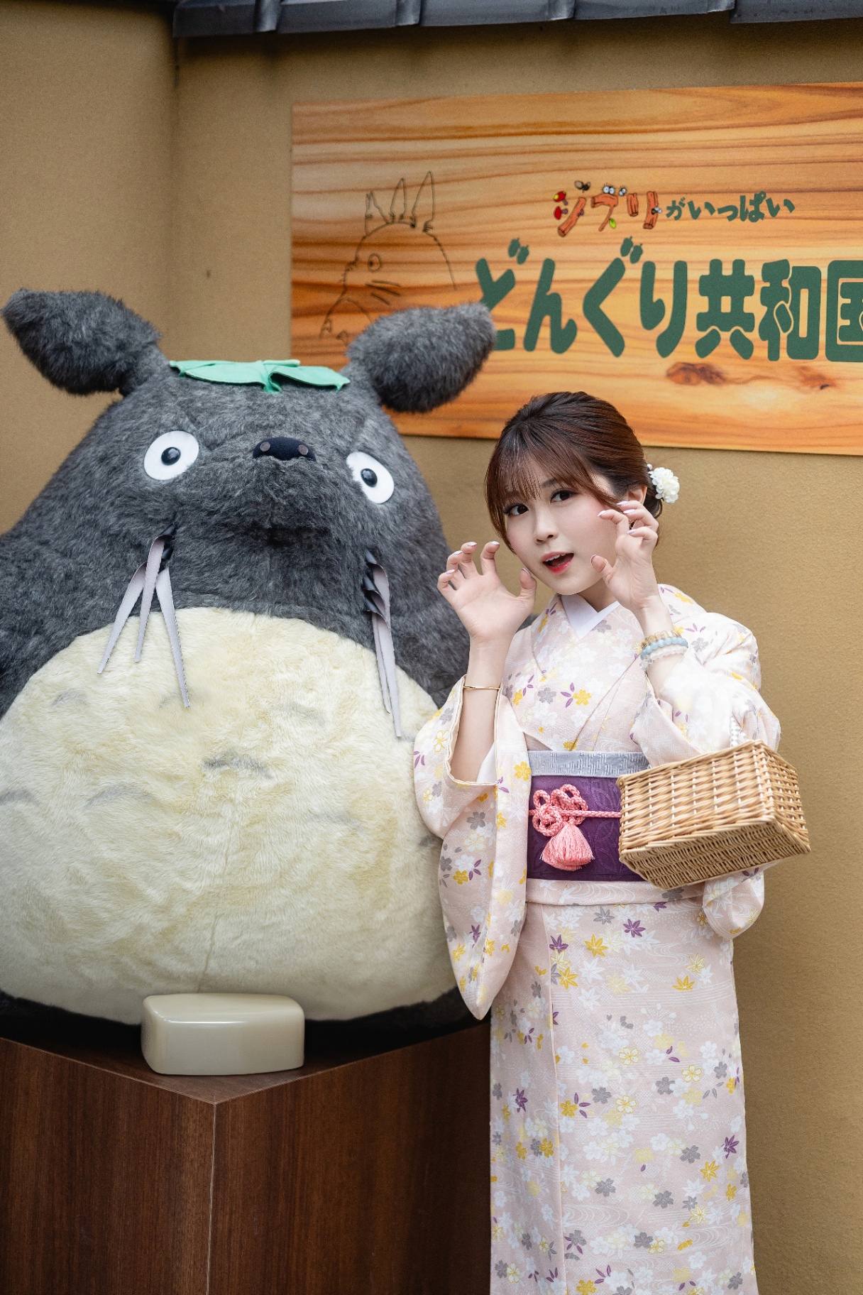 Vivihime in a soft pink kimono at a Ghibli-themed shop